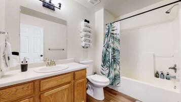 Bathtub, hair dryer, towels