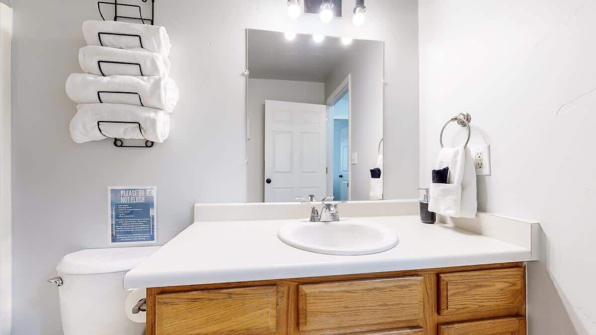 Bathtub, hair dryer, towels