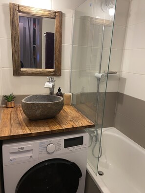 Hair dryer, soap, shampoo, toilet paper