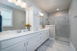 Shower, hair dryer, towels, soap