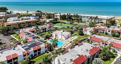 Blissfull Bay: Runaway Bay - Bayfront Condo! Largest Heated Pool by Anna Maria Life Vacation Rentals