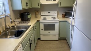 Fridge, microwave, oven, stovetop - Entire Condo with community pool and in unit laundry (Gainesville)