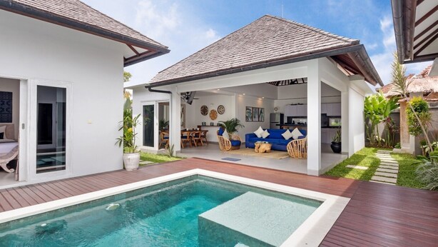 A modern house with a swimming pool, a covered patio, and a well-maintained garden. - Beautiful 3BR Villa W/ Private Pool in Bali, Bali Villa 2207 (Bali)
