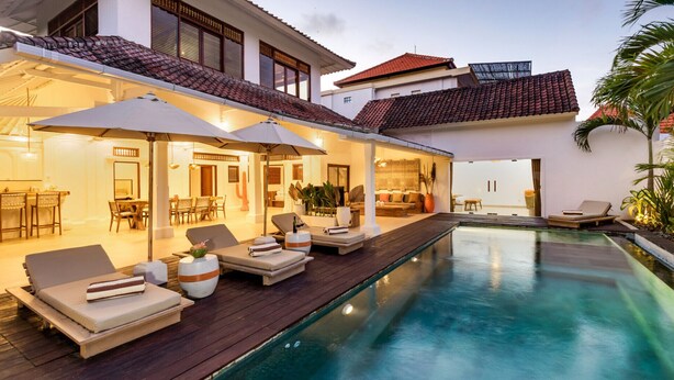 A modern house with a swimming pool, outdoor seating, and a dining area. - Wonderful 4BR Villa with Pool, Bali Villa 2212 (Bali)