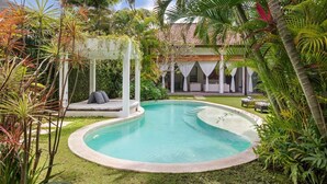 A private pool surrounded by lush greenery and a white gazebo. - Cozy 2BR Villa W/Amazing Pool Area, Bali Villa 2216 (Bali)