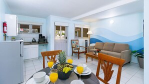 A compact living space with a kitchen, dining area, and a living room. - 2BR 1BA Ground Level in the Heart of Aruba ~ Pool (Noord)