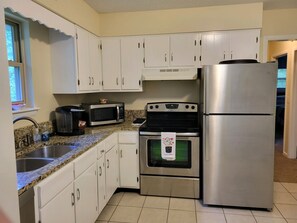 Fridge, microwave, oven, stovetop - Stock Cottage Cozy 2 BR, 2 Bath House next to Biology Trails and SAU (Ooltewah)