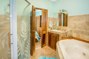 Shower, jetted tub, hair dryer, towels