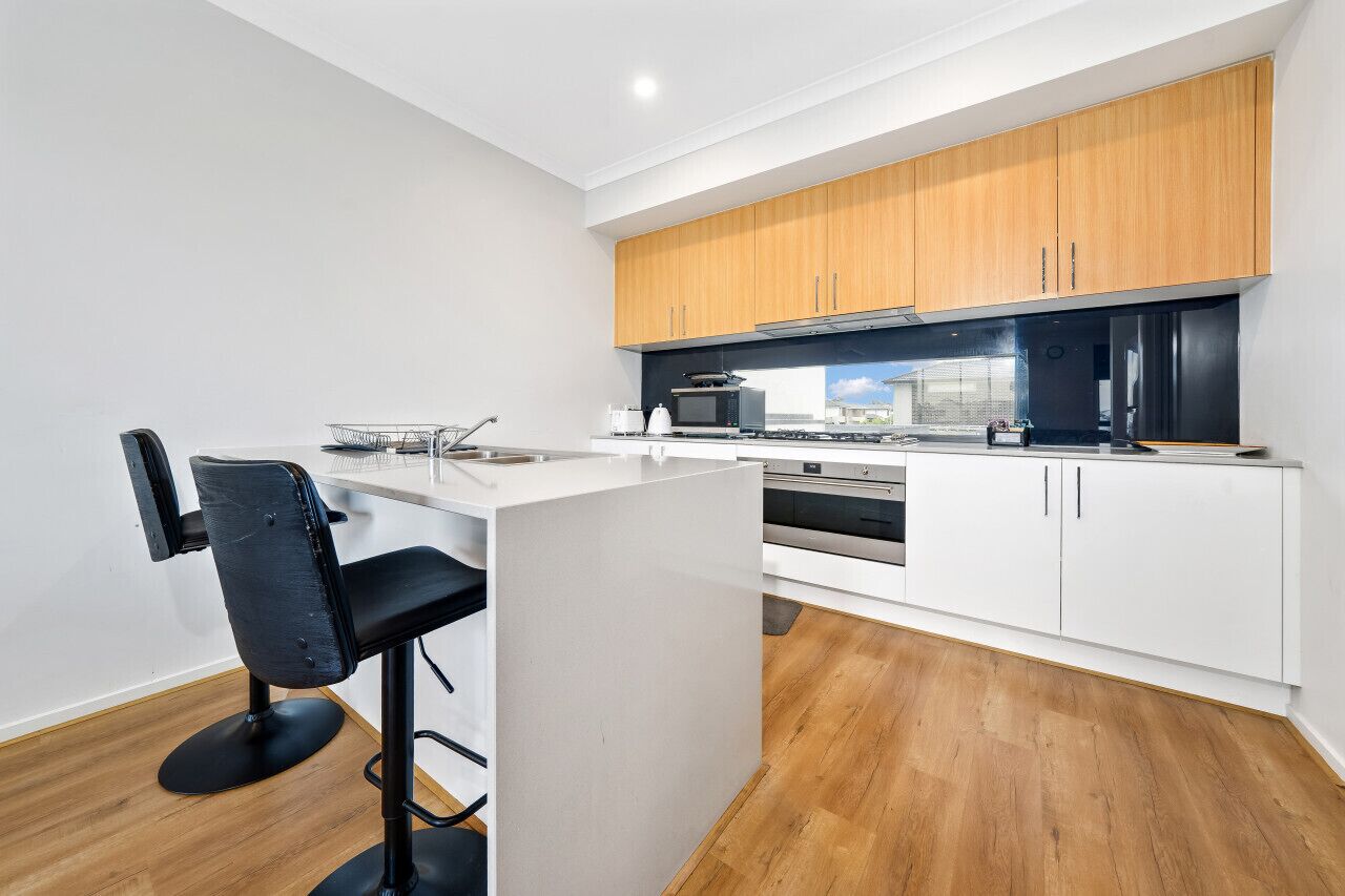 Fridge, high chair, cookware/dishes/utensils