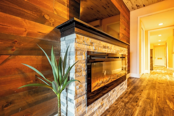 Loft, 1 Bedroom, City View | Living area | 75-inch Smart TV with digital channels, fireplace, Netflix