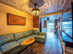Loft, 1 Bedroom, City View | Living area | 75-inch Smart TV with digital channels, fireplace, Netflix - BurgBnB Downtown (Harrisburg)