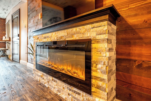 Loft, 1 Bedroom, City View | Living area | 50-inch Smart TV with digital channels, fireplace, Netflix