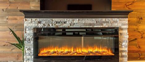 Loft, 1 Bedroom, City View | Living area | 50-inch Smart TV with digital channels, fireplace, Netflix