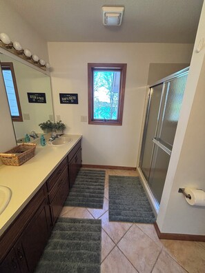 Shower, hair dryer, towels, soap