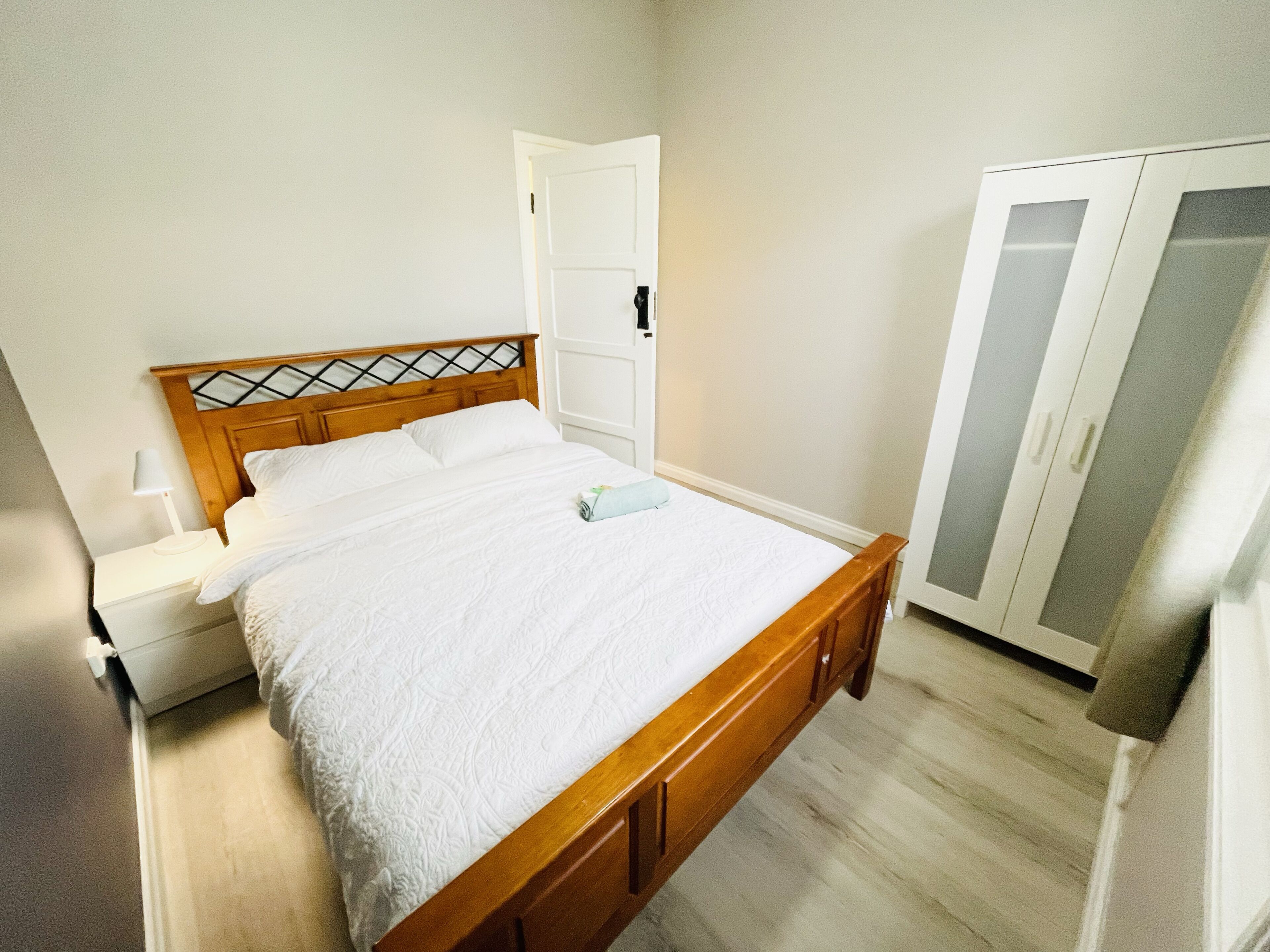 Large backyard with outdoor seating and BBQ!