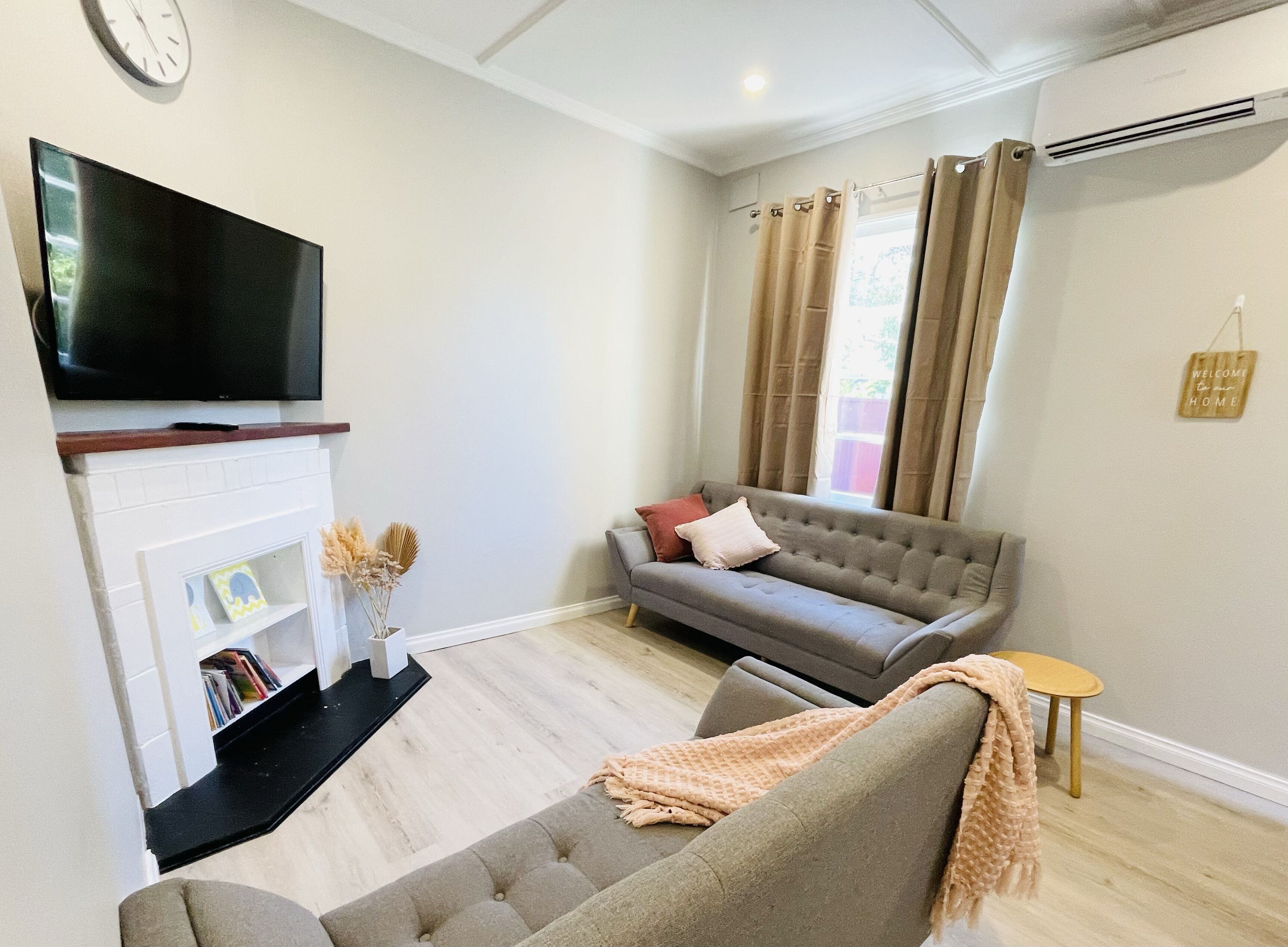 Large backyard with outdoor seating and BBQ!