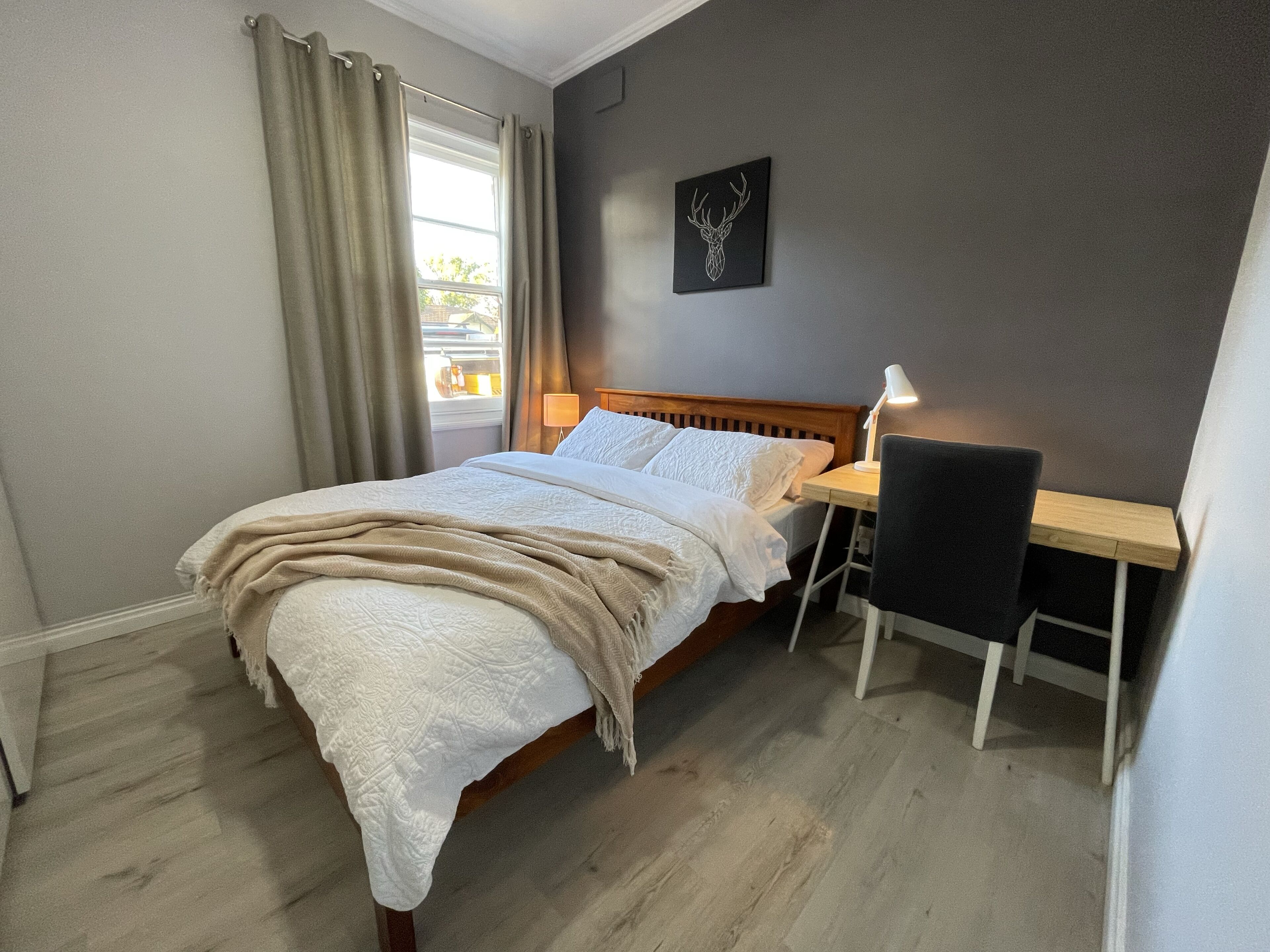 Large backyard with outdoor seating and BBQ!