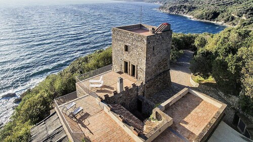 Torre Rivellina: A characteristic three-story ancient watch tower built sheer above the sea and with direct access to the sea, with Free WI-FI.