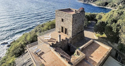 Torre Rivellina: A characteristic three-story ancient watch tower built sheer above the sea and with direct access to the sea, with Free WI-FI.