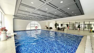 Indoor pool, open 6:00 AM to 9:00 PM, lifeguards on site