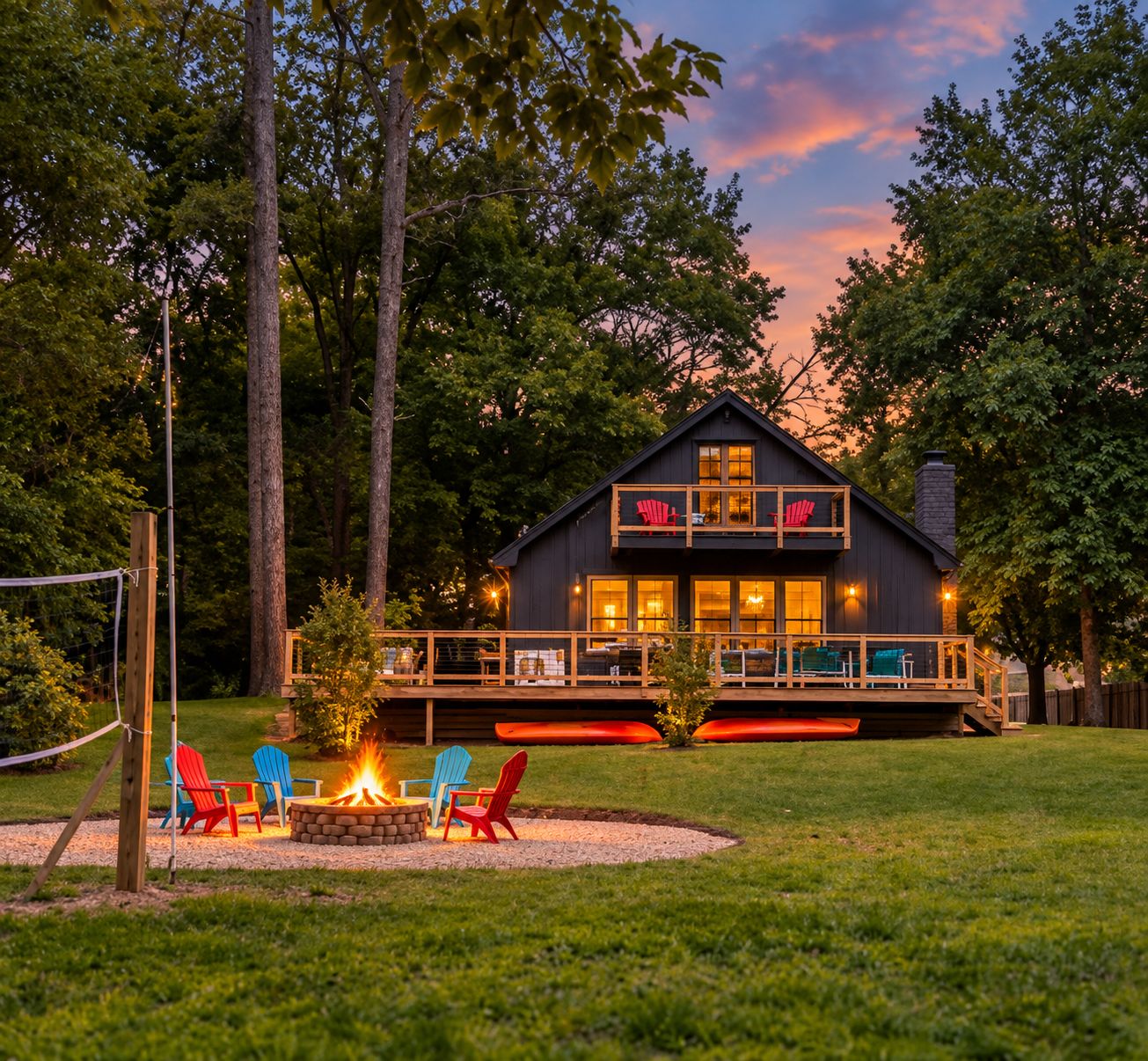 A cabin with a deck, outdoor seating, and a fire pit.