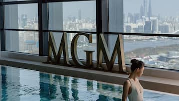 Indoor pool, open 6:30 AM to 10:00 PM, pool loungers, lifeguards on site