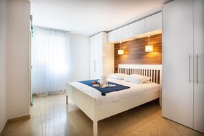 3 عدّة غرف نوم ومكواة/لوح كي وواي فاي مجانًا وملاءات أسرّة