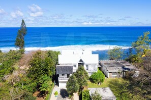 A coastal house with a view of the ocean.