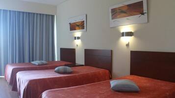 Triple Room | Minibar, desk, laptop workspace, free WiFi