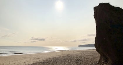 Stunning Coastal Cottage - Sleeping 10 in 4 Bedrooms - Pool and Beach Access Included.