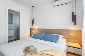 2 chambres, fer et planche à repasser, Wi-Fi, draps fournis