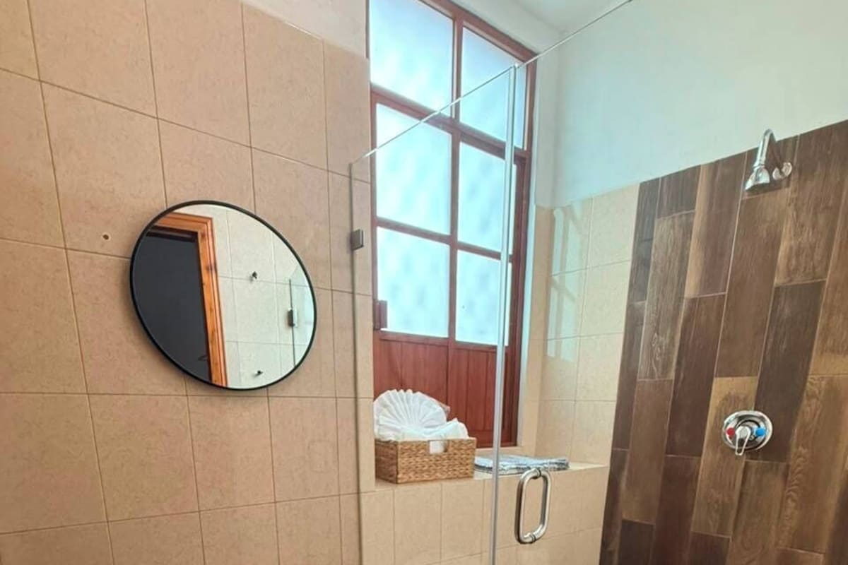 Junior Room, 1 Bedroom, Non Smoking, Garden View | Bathroom | Shower, rainfall showerhead, hair dryer, towels