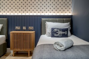 3 slaapkamers, een strijkplank/strijkijzer, gratis wifi, beddengoed