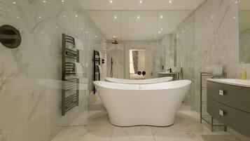 Bathtub, hair dryer, towels, soap