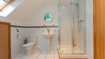 Bathtub, hair dryer, towels, soap