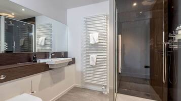 Bathtub, hair dryer, towels, soap