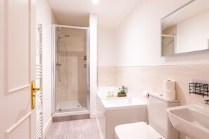 Shower, hair dryer, towels, soap