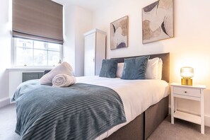 2 bedrooms, desk, iron/ironing board, travel crib