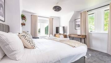 2 slaapkamers, een strijkplank/strijkijzer, gratis wifi, beddengoed