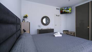 3 slaapkamers, een strijkplank/strijkijzer, gratis wifi, beddengoed