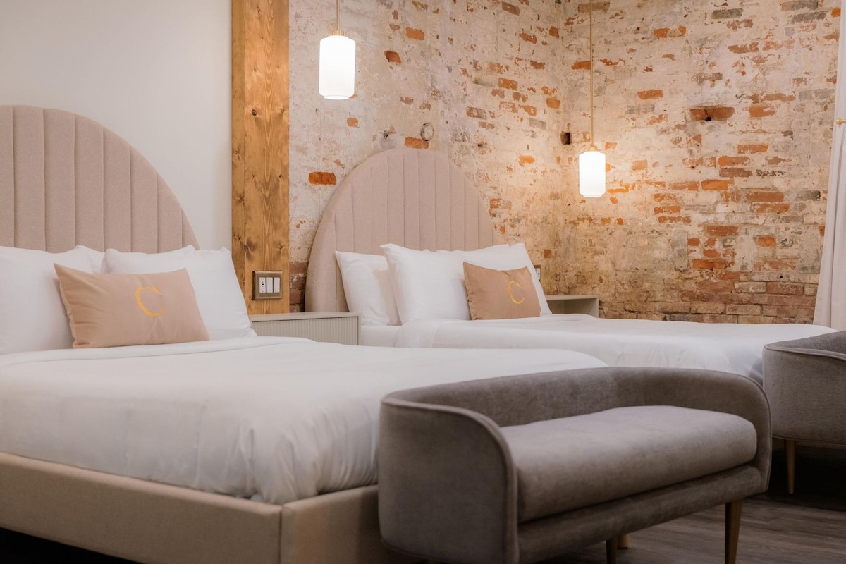 Premium bedding, down duvets, blackout curtains, iron/ironing board