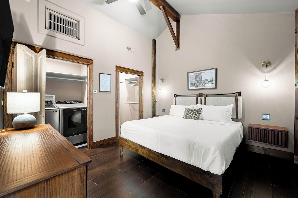 Premium bedding, down duvets, blackout curtains, iron/ironing board
