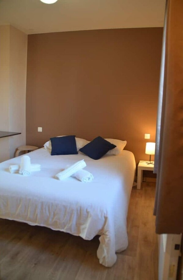 1 bedroom, desk, iron/ironing board, bed sheets