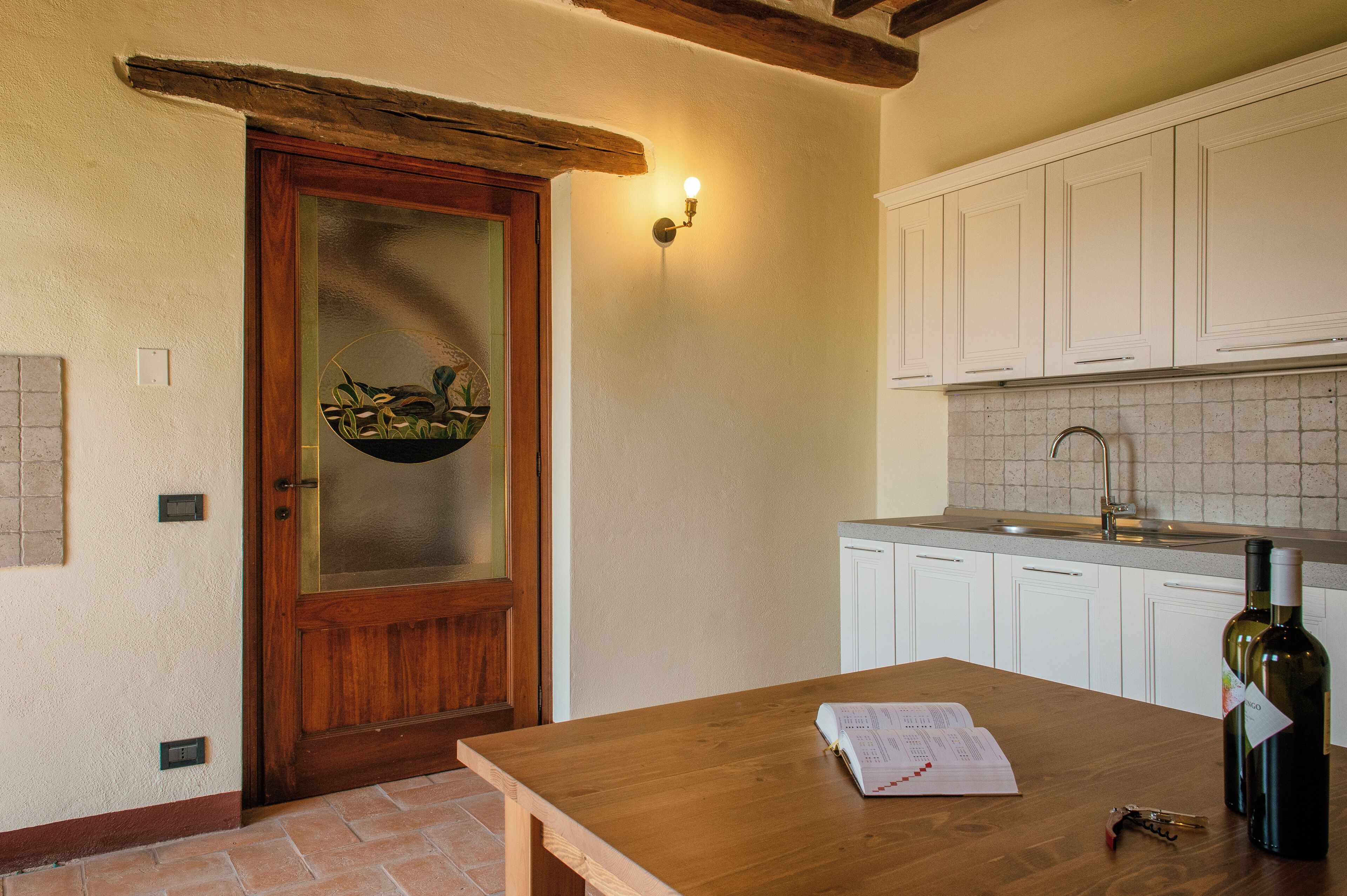 Condo | Private kitchen | Fridge, stovetop, cookware/dishes/utensils, cleaning supplies