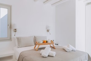 Tabla de planchar con plancha, wifi gratis y ropa de cama 