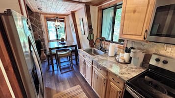 Coffee/tea maker, fridge, microwave, oven
