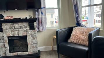 Smart TV, fireplace, video games, stereo