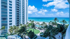 A high-rise hotel with a view of a beach and ocean. - 504-505 International Resort 2 Bed 2 Ba 1600Sf Ocean View (Sunny Isles Beach)