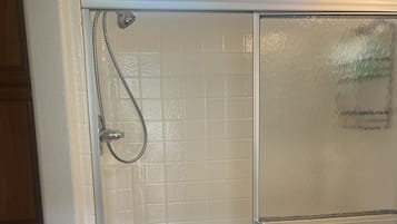 Hair dryer, towels, soap, shampoo