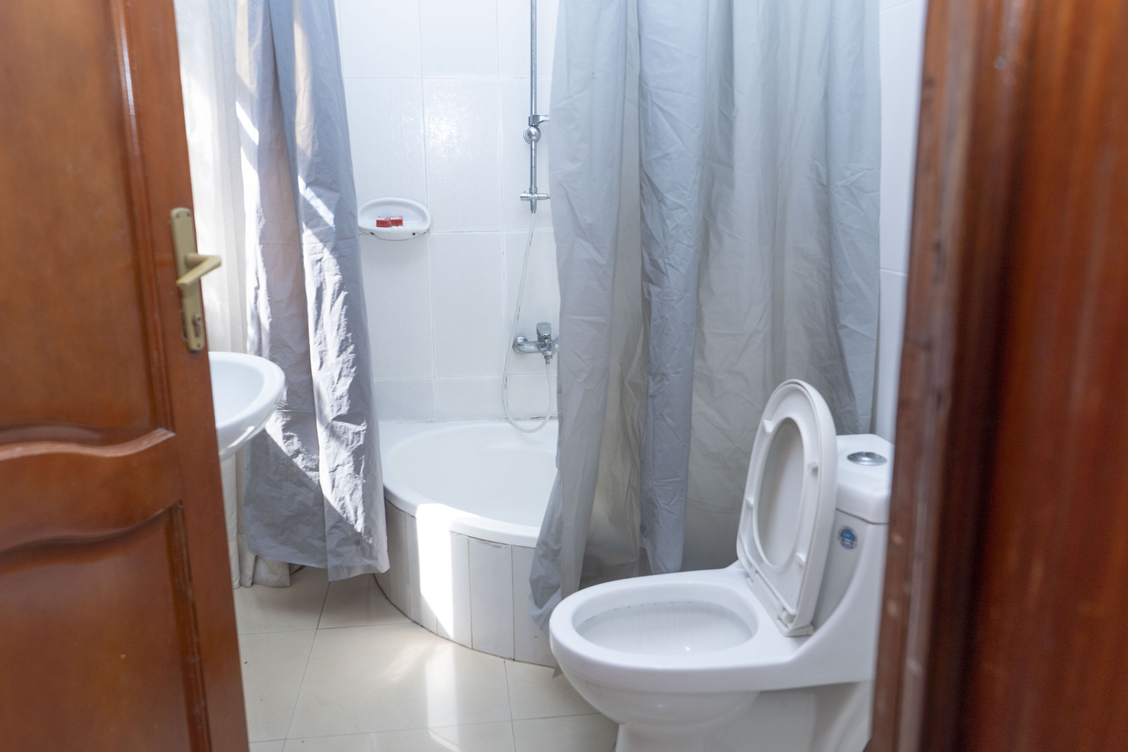 Hydromassage showerhead, designer toiletries, hair dryer, bathrobes